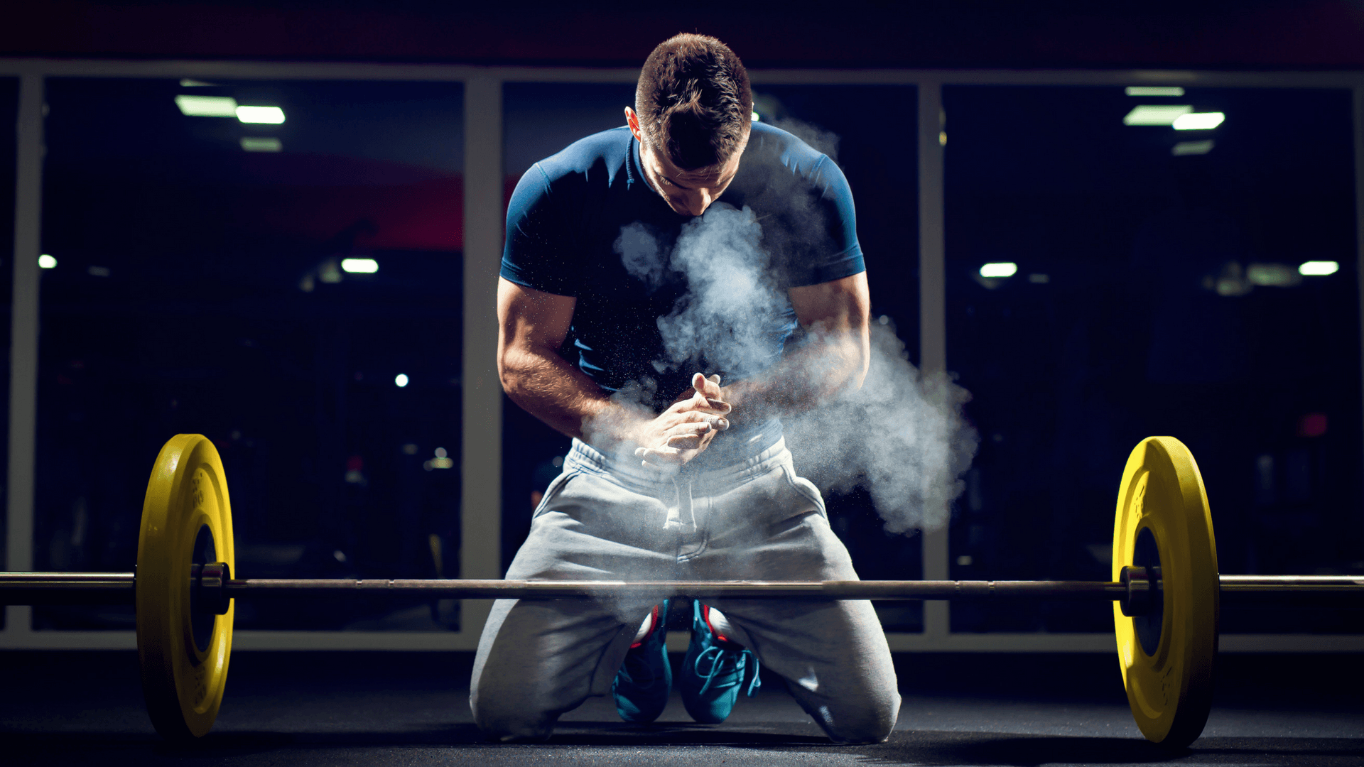 man with barbell