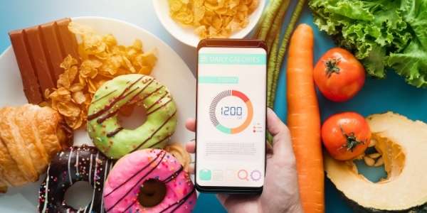 Calorie intake is about averages. One cheat meal or heavy meal won't ruin your diet unless you start binge eating afterwards!