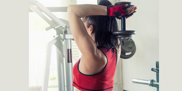 woman doing a Overhead tricep extensions